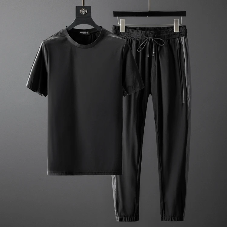 

Summer fashion brand leisure sports suit men's two-piece set of contrast color seamless pressure glue ultra-thin four side