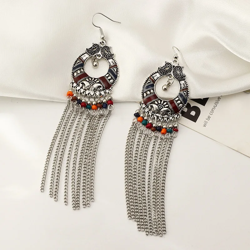 

Earrings 2021 trend Retro long drip tassels eardrop national hollow-out the bell earrings earrings for women Unusual earrings