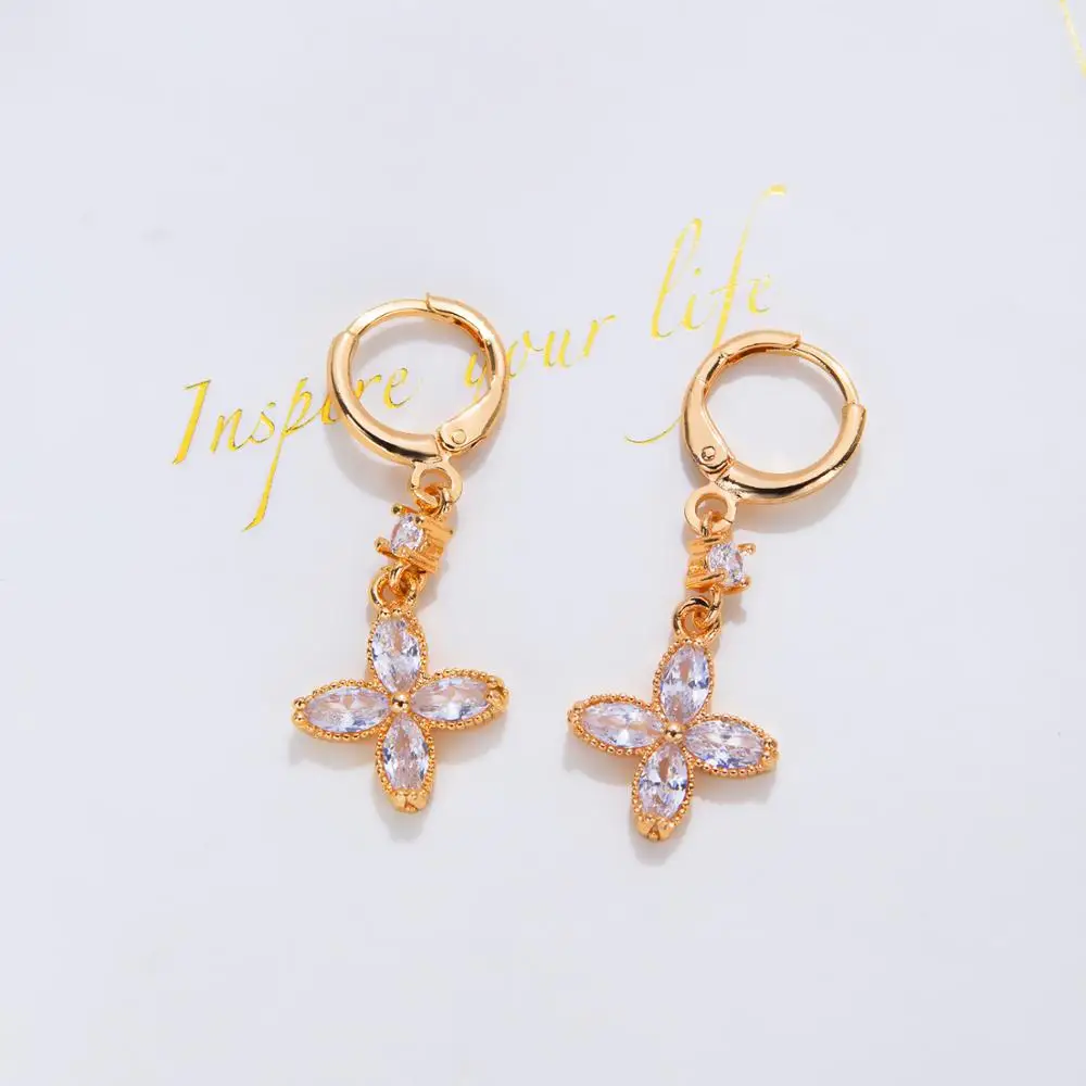 Элегантные серьги с геометрическим цветком и кристаллами золотого цвета