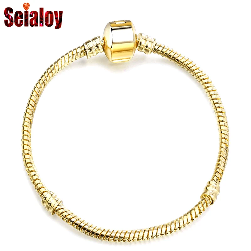 Плотный браслет Seialoy из розового золота с инкрустацией в форме сердца и змеиная