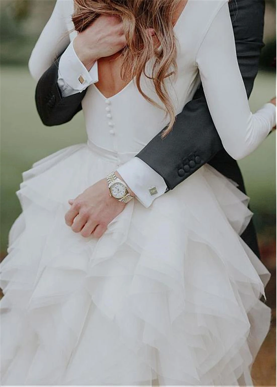 Роскошные свадебные платья а силуэта с оборками из органзы длинными рукавами и