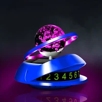 solar car solid perfume seat planet rotating double ring suspension car decoration with atmosphere light luminous parking number