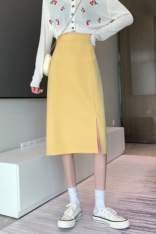 

Temperament split black skirt 2021 spring new women's skirt high waist thin medium length one-step hip skirt