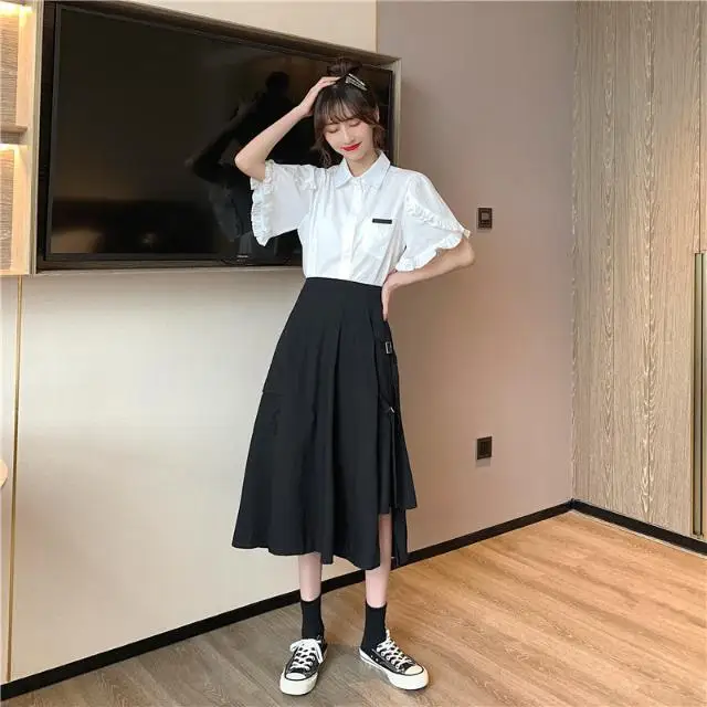 

Irregular skirt with pocket, medium length, high waist, loose and thin