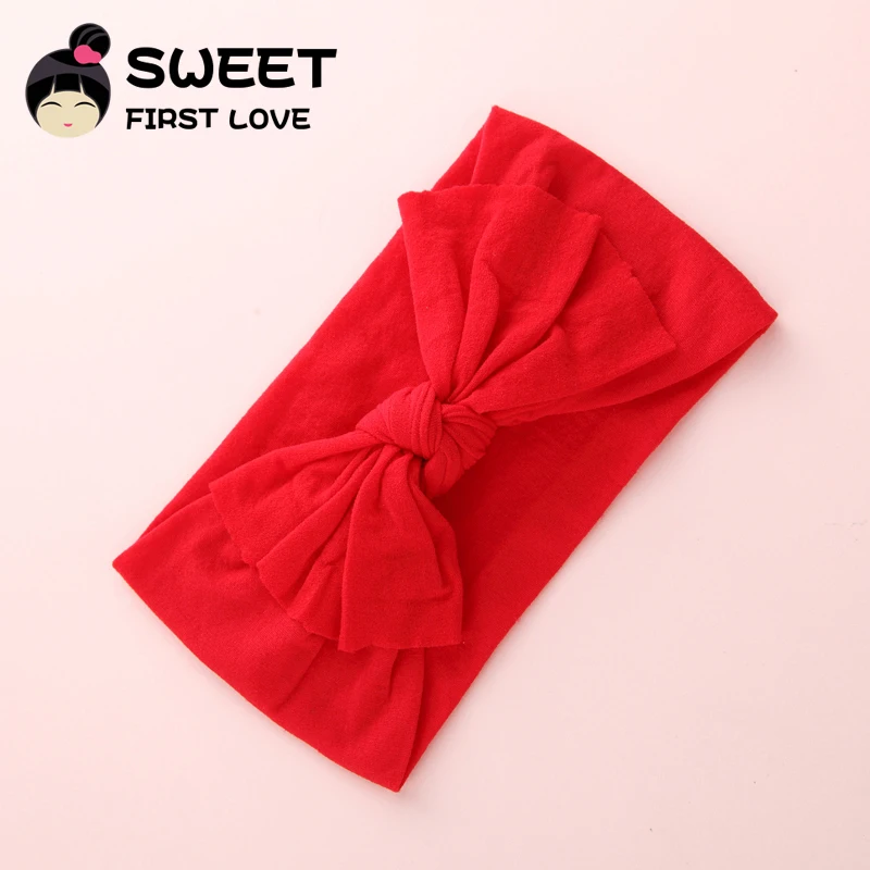 Повязка на голову женская с большим бантом нейлоновая мягкая эластичная лента