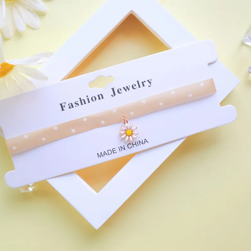 Женское колье-чокер в горошек с подвеской виде цветка | Украшения и аксессуары