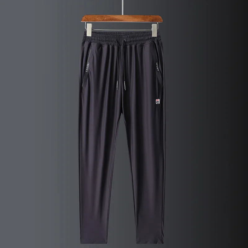 

Summer fat plus size ice silk pants 2020 simple sports fast drying pants lightweight large men's casual pants