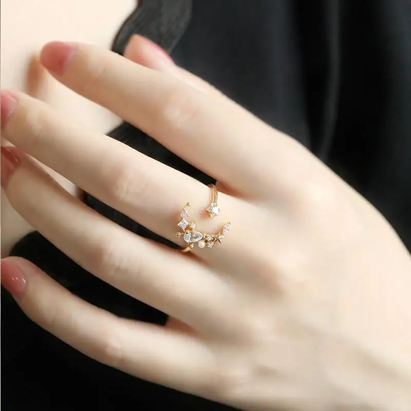 

The designer's unique creative silver inlaid zircon opening adjustable ring in the retro small charm lady brand jewelry
