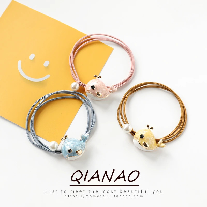 Версия QIANAO популярного нового товара - маленькая упряжка для волос с головными украшениями в виде маленького единорога и дельфина.