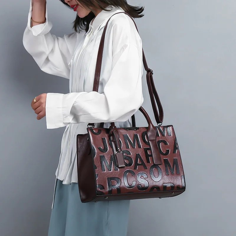 

2020 Women's Top Quality Leather Handbag Luxury Designer Textured Letter Embossed Large Capacity Portable Shoulder Messenger Bag