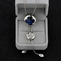 korean version of four leaf clover long chain womens hundred matching fashion pendant four petal flower crystal jewelry