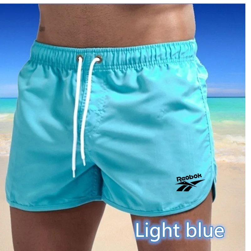 

New men's fitness bodybuilding shorts men's summer gym exercise men's breathable quick-drying sportswear jogging beach shorts