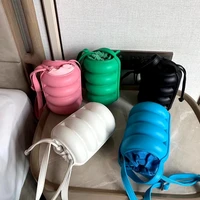 drop shipping 2021 wave bucket bag expansion cylinder drawstring bag caterpillar cute cylindrical irregular solid jelly handbag