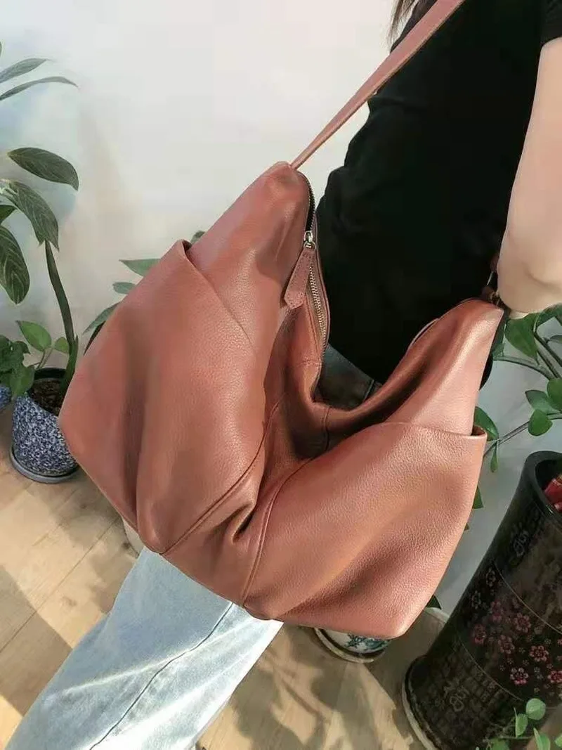 

Free shipping first layer cowhide messenger bag shoulder bag new big bag female bag large capacity casual shoulder bag lady bag