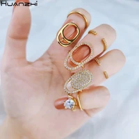 huanzhi 2020 new rhinestone hollow metal trendy cool fingertip nail shining armor ring for women girls jewelry party accessories
