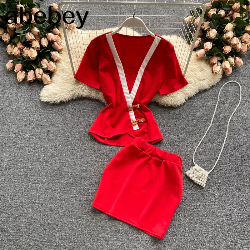 

Женский летний костюм, топ с коротким рукавом и глубоким V-образным вырезом + юбка-трапеция средней длины с высокой талией, комплект из двух п...