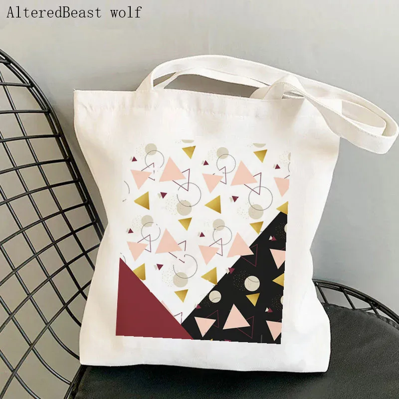 

Женская холщовая сумка-шоппер с треугольниками и принтом