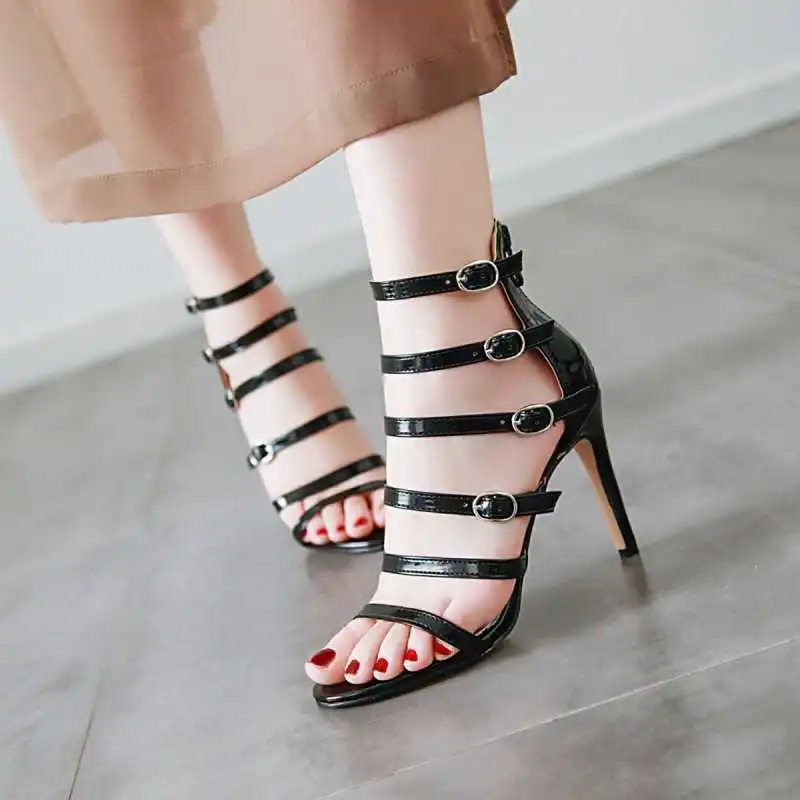 

2021 new net red sandals women's summer hollow out high heels large wine glass with buckle Roman sandals women's