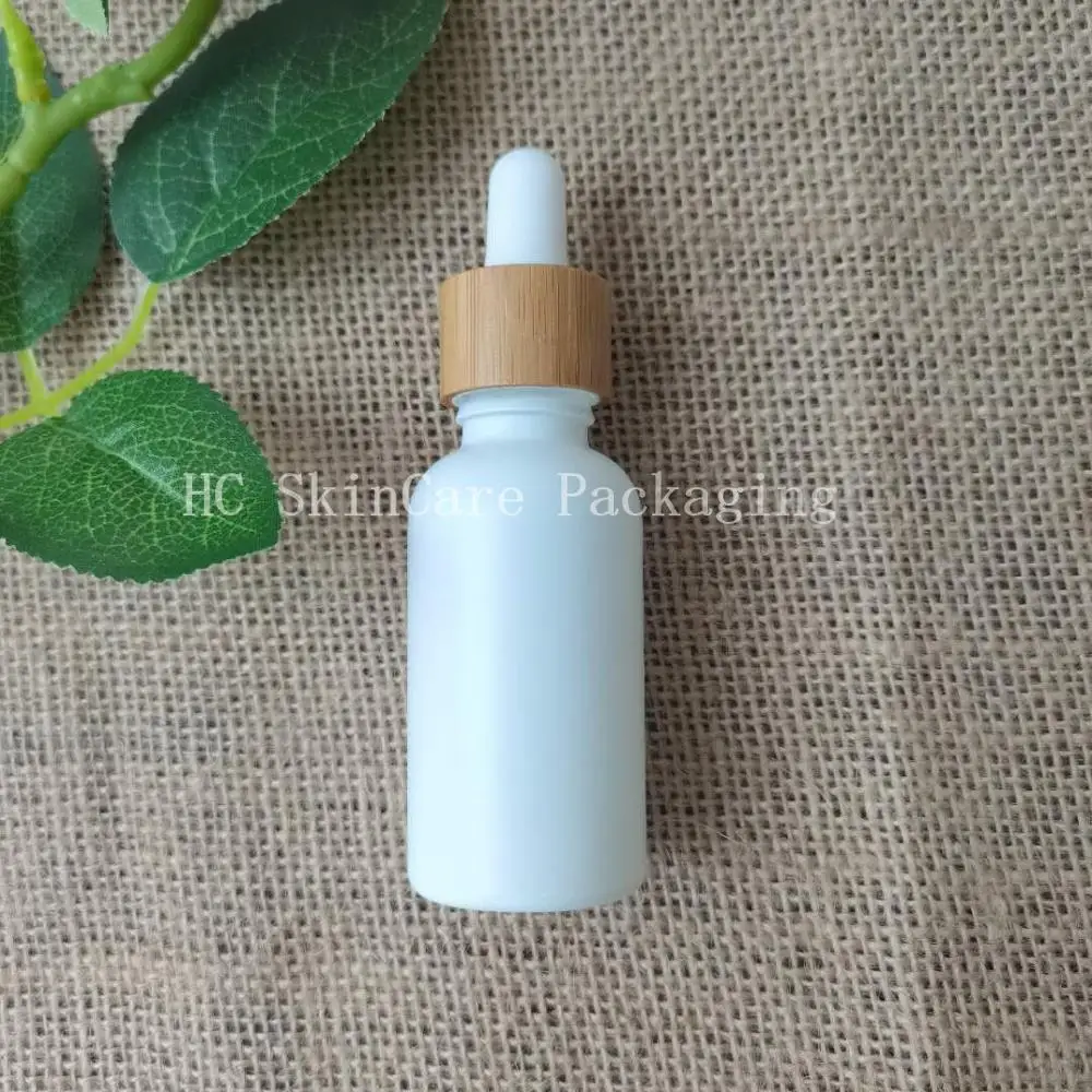 

Beauty 30ml Empty Skin Care Essential Oil Colorful Glass Dropper Bottle With Bamboo Wood Lid Perfume Bottles Packaging Container