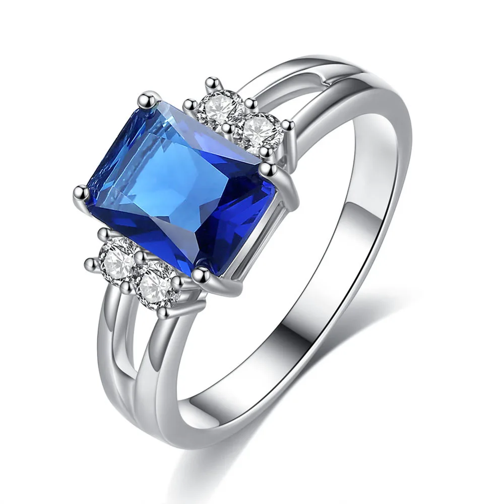 Женское кольцо с квадратным когтем инкрустированное цирконием несколько цветов