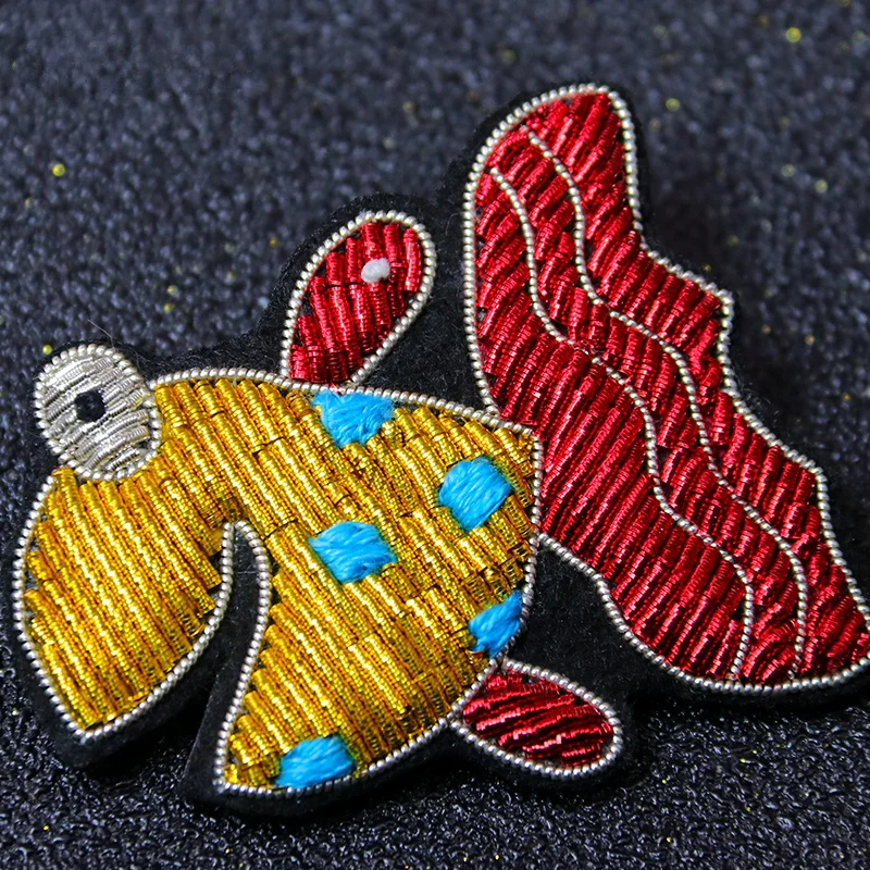 

Hand-embroidered marine brooch cartoon doll fish cute brooch high-end female accessories Indian silk badge