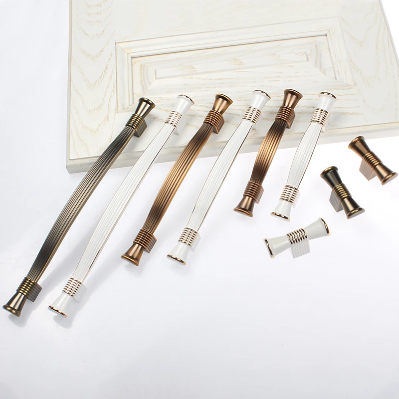 Ручки и ручки для шкафов в современном европейском стиле цвета слоновой кости