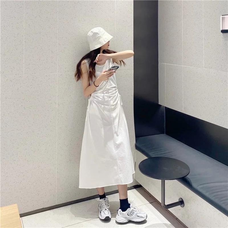

The new round neck vest white dress fashion careful machine side waist hollowed out thin long skirt dresses