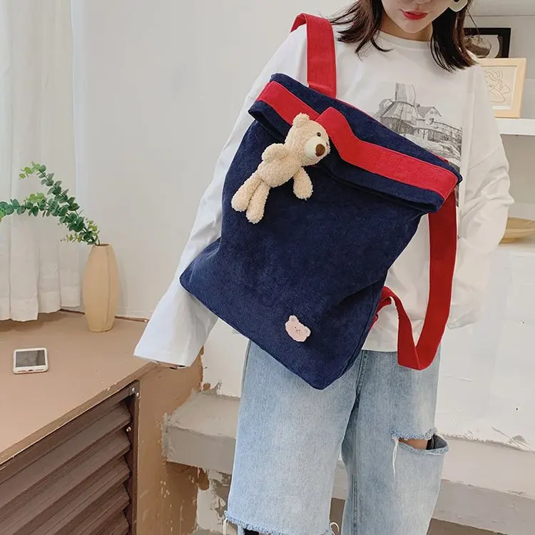 

Schoolbag female 2021 new college style junior high school students personality corduroy backpack men and women j fitness travel