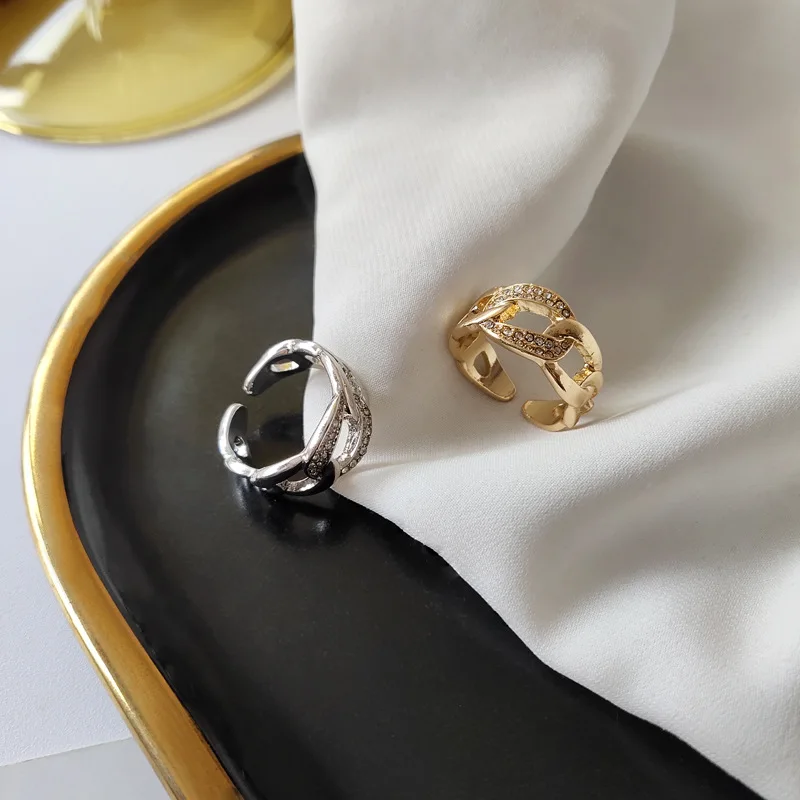 

Fashion design sense chain open ring hollow diamond simple couple ring