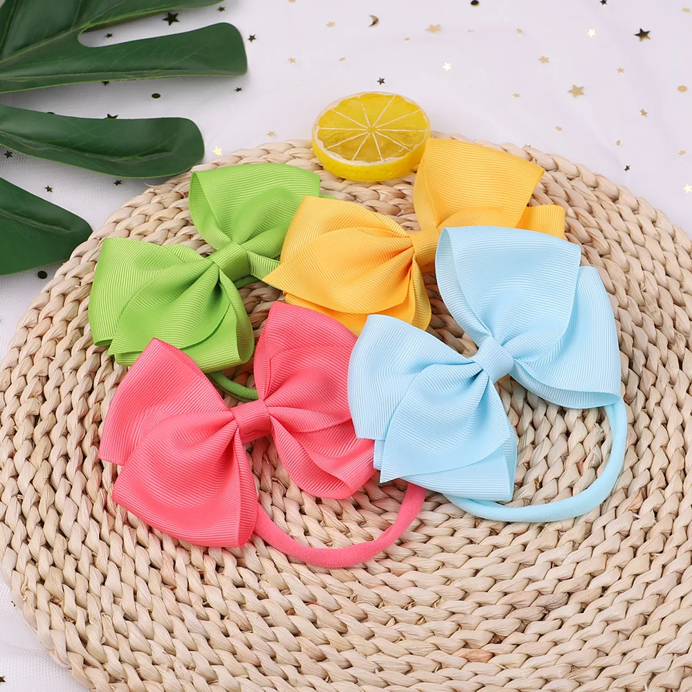 

Повязка на голову с бантом, однотонная, 12,5 см