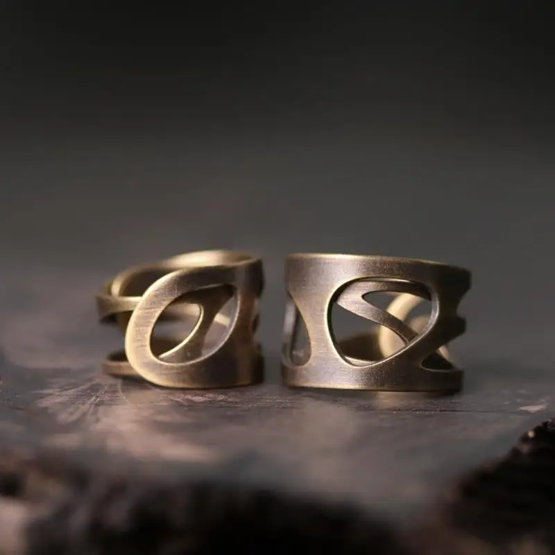 

Original designer lucky hollow process open ring ingot pattern Chinese retro light luxury charm female silver jewelry