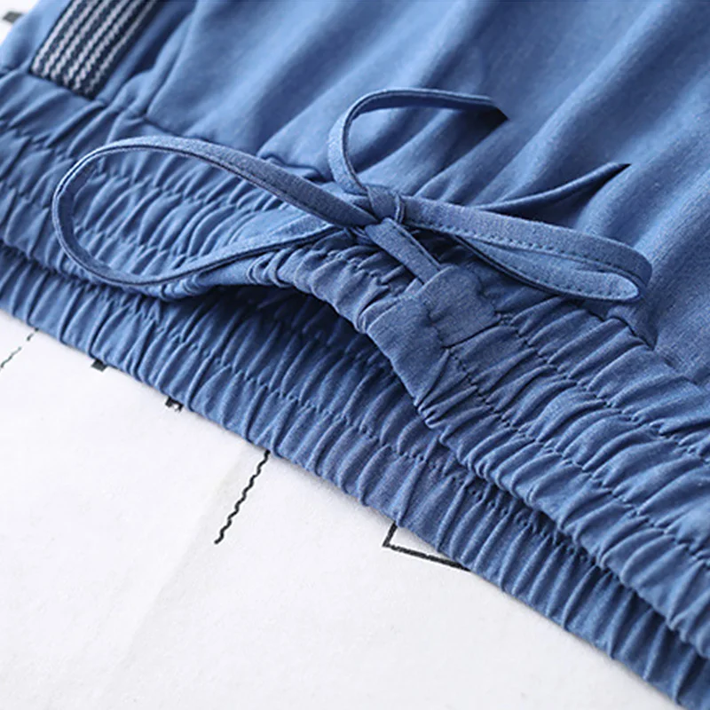 Женские летние джинсы с широкими штанинами тонкие однотонные на шнуровке