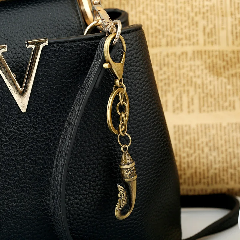 Брелок для ключей из сплава с четырьмя листьями и крыльями рыбьей кости брелок