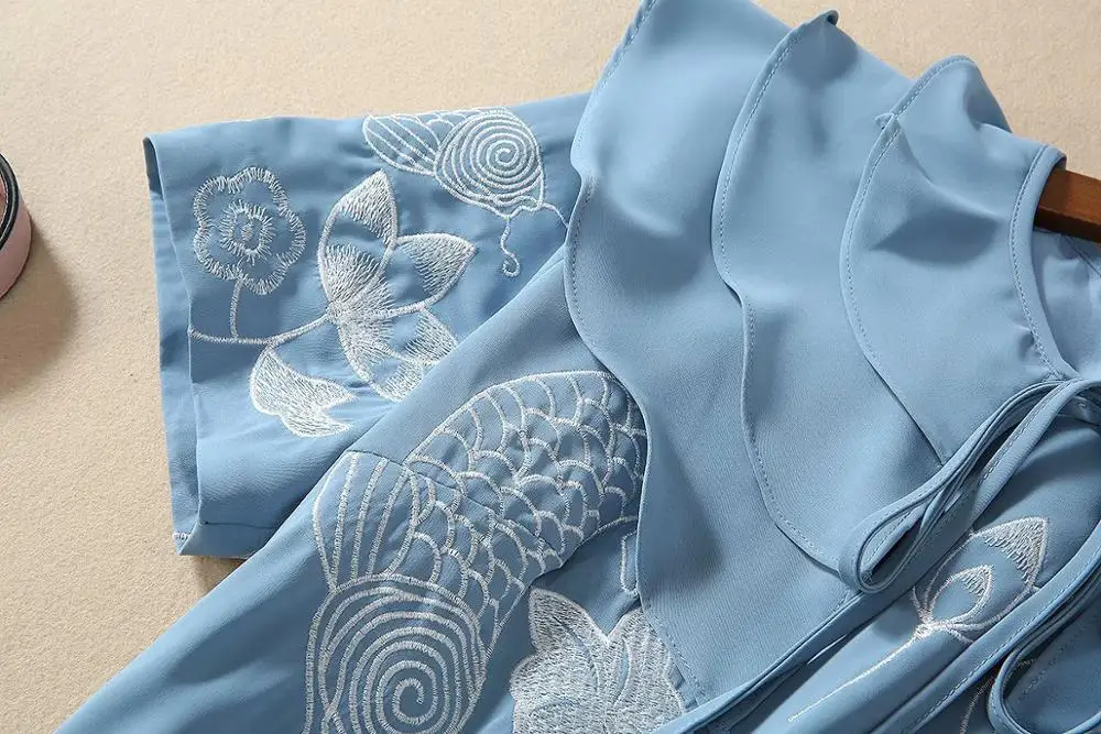 

Spring 2020 for European and American women's wear Short sleeves with flounce collar Heavy embroidery Fashionable blue dress
