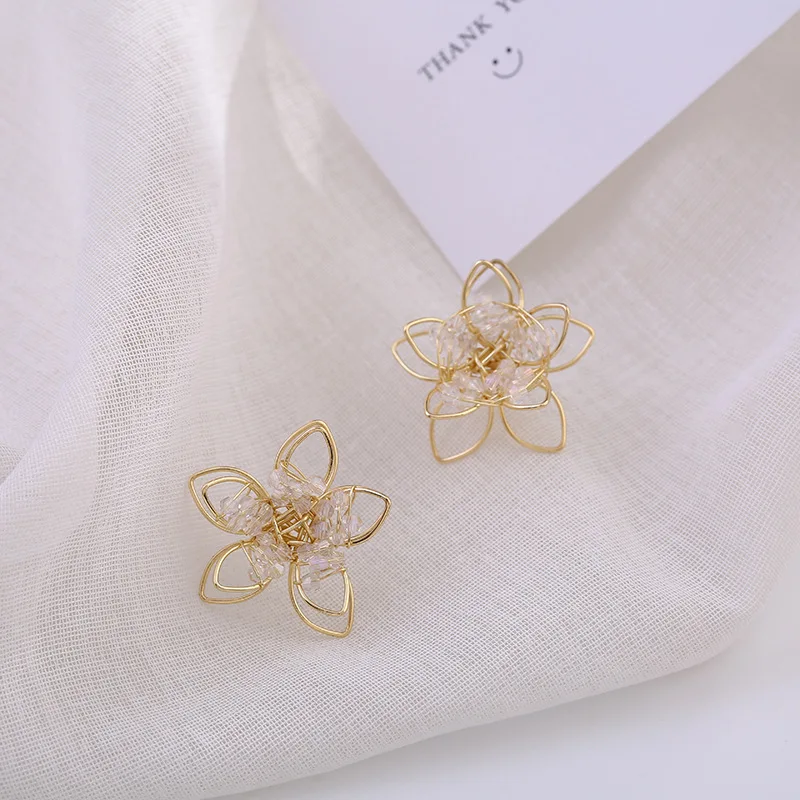 

Metal hollow out petal crystal earrings aestheticism fashion geometry stud earrings