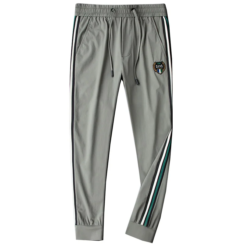 

Gray-green side stripes webbing casual sports pants men's back pocket zipper ice silky men's trousers