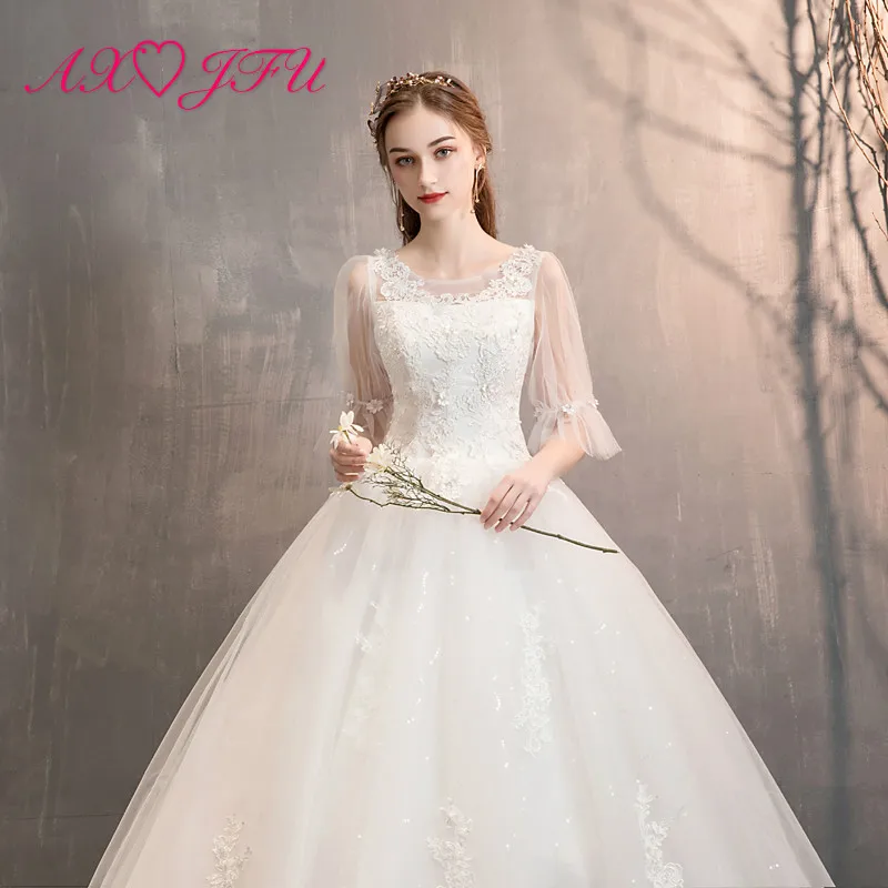 

AXJFU princess white illusion flower lace wedding dress party vintage o neck beading crystal flare sleeve sparkly wedding dress
