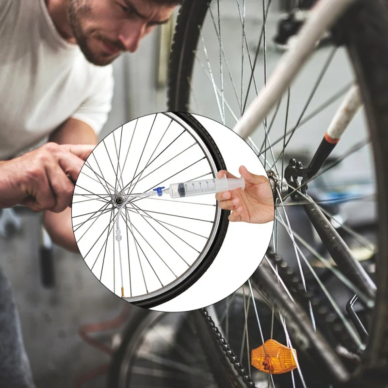 

MTB Mountain Road Bicycle Bike Tubeless Sealant Injector With Multifunctional Valve Cap Valve Core Tools For Bike Tubeless Tire