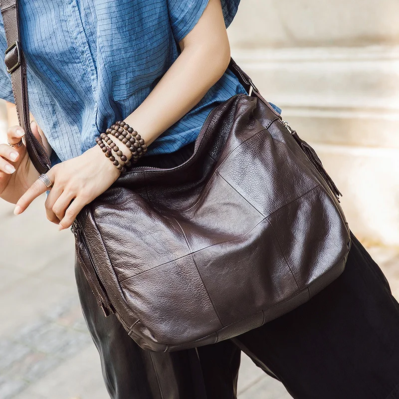 

Guangzhou top layer cowhide women's bag fashion tassel single shoulder bag oblique span large bag simple and generous