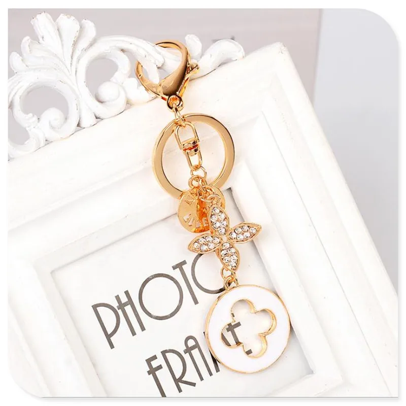 Цепочка для ключей в виде клевера изящная металлическая подвеска автомобиля