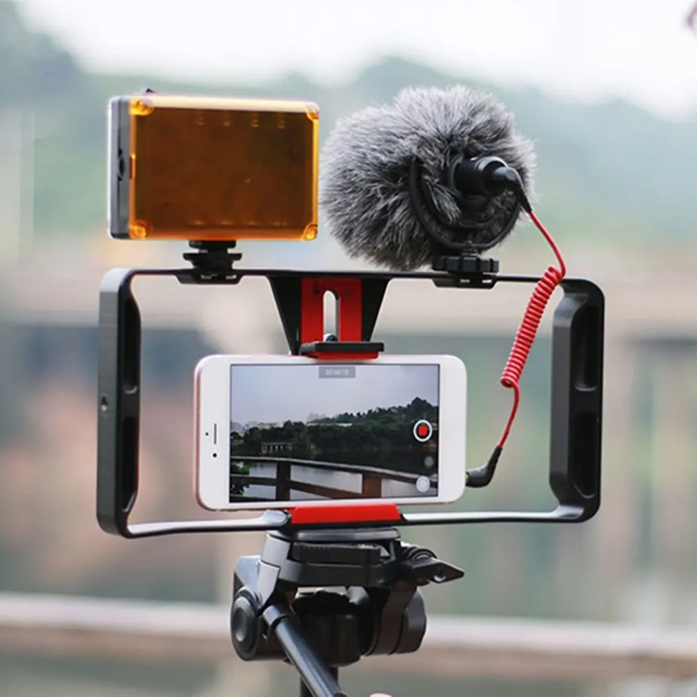 

Video Camera Cage Stabilizer Film Making Rig For Smart Phone Video Rig Mobile Phone Holder Hand Grip Bracket Phone Stabilizer