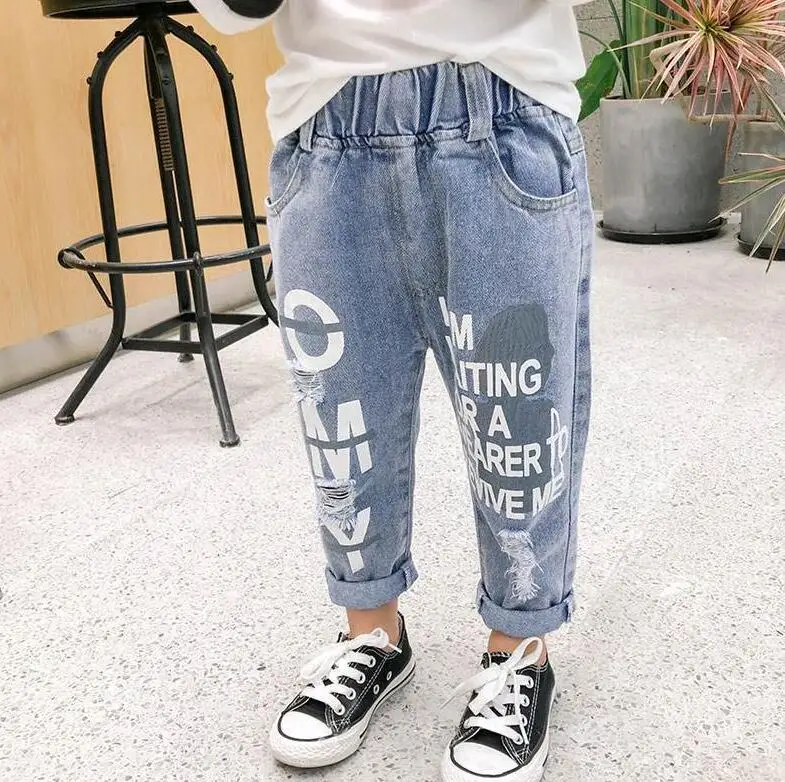 

OHMETOY Baby Boys Girls Jeans Pants New Children Trousers 1-7Yrs Boys Girls Jeans Boys Casual Pants Cartoon Cat Jeans For Kids