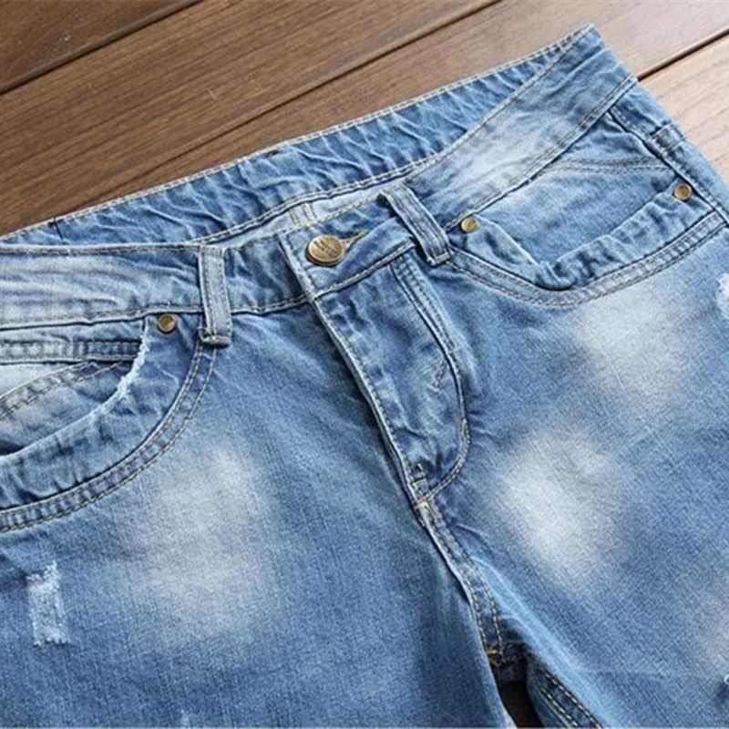 

Men's vintage light blue holes ripped biker jeans for motorcycle Casual pleated torn stretch denim slim pants