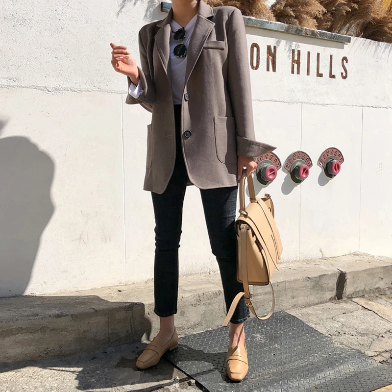 Женские джинсы с разрезом сбоку Mozuleva черные повседневные Стрейчевые высокой