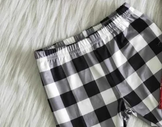 Новинка 2020 года Модные черные клетчатые расклешенные брюки в рождественском