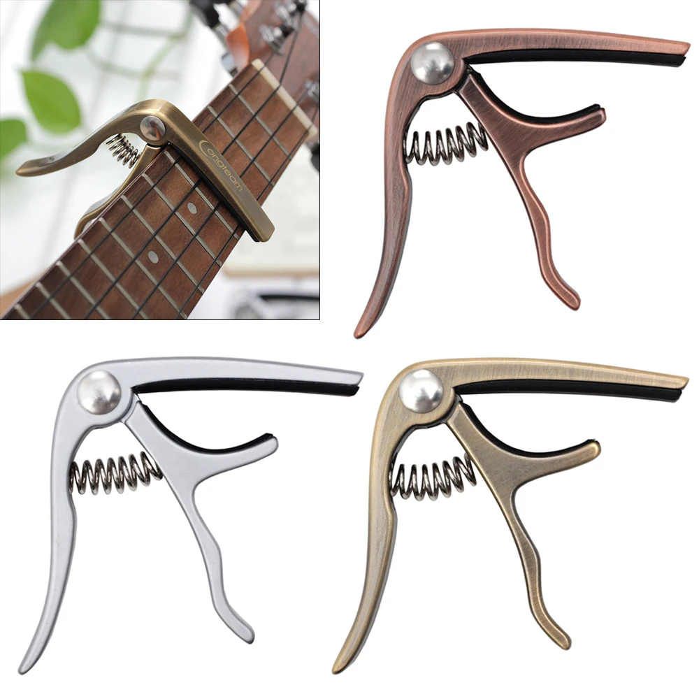 

Zinc Alloy Ukulele Capo with High Grade Steel Spring and Perfect Silicon Cushion 3 Colors Optional