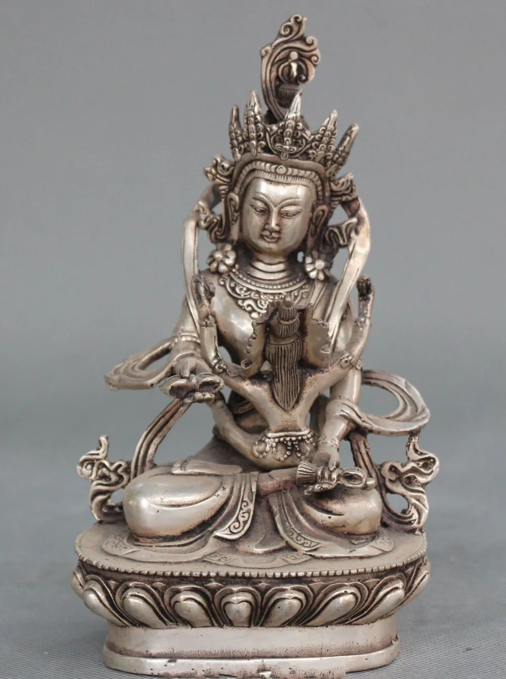 

DECORATION BRONZE FACTORY OUTLETS TIBET SILVER CHINESE TIBETAN BUDDHISM SILVER SEAT MANDKESVARA BUDDHA HOLD VAJRADHARA STATUE