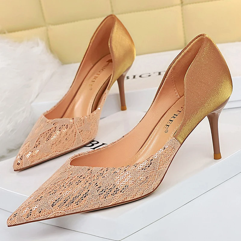 

Туфли-лодочки женские на высоком каблуке с острым носком и блестками