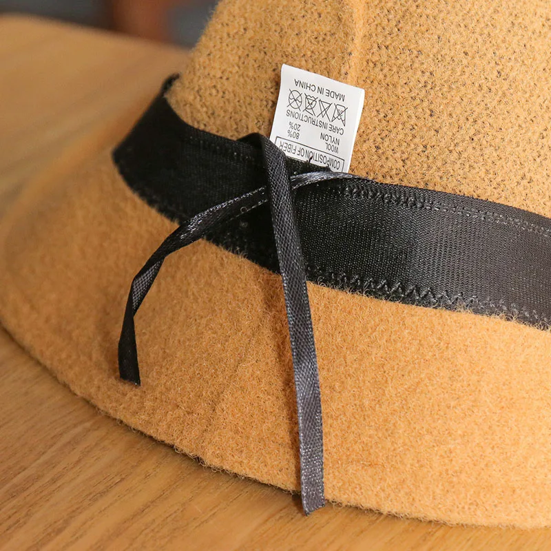 

Women's autumn winter Korean versatile fisherman's hat sunshade sunscreen solid color breathable lotus brim woolen basin hat