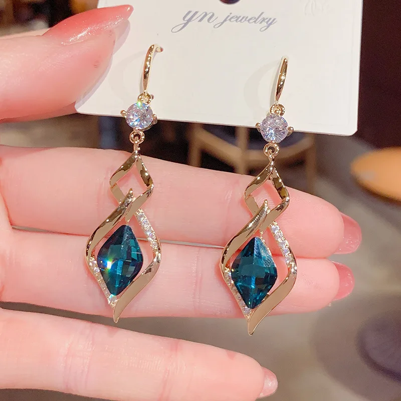 

Gold Colour Double Circles Earring with Vintage Blue Crystal for Women's Delicate Statement Earrings